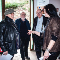 Elaine at the entrance with artist Verdiano Marzi, Patrick McQaire and president of 3 R Jean-Marie Burton