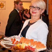 Marianne Boisson, proprietor of La Tour Bajole, offers a tempting array of canapés with waiter ʻfor the dayʼ Louis Cretin in the background (Photos Tony Stamp)